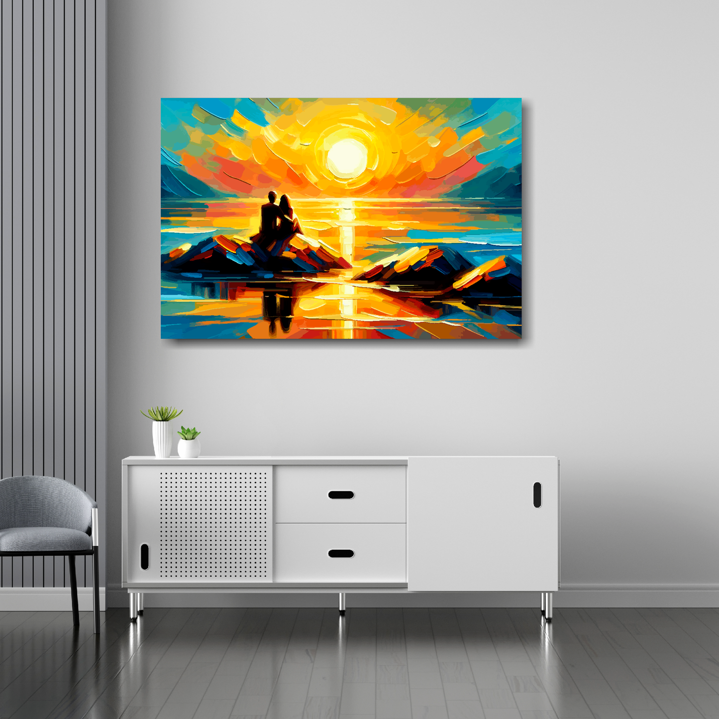 36 inch by 24 inch abstract canvas print of a romantic couple watching a vibrant sunset. Mounted on a white wall above a white sideboard.