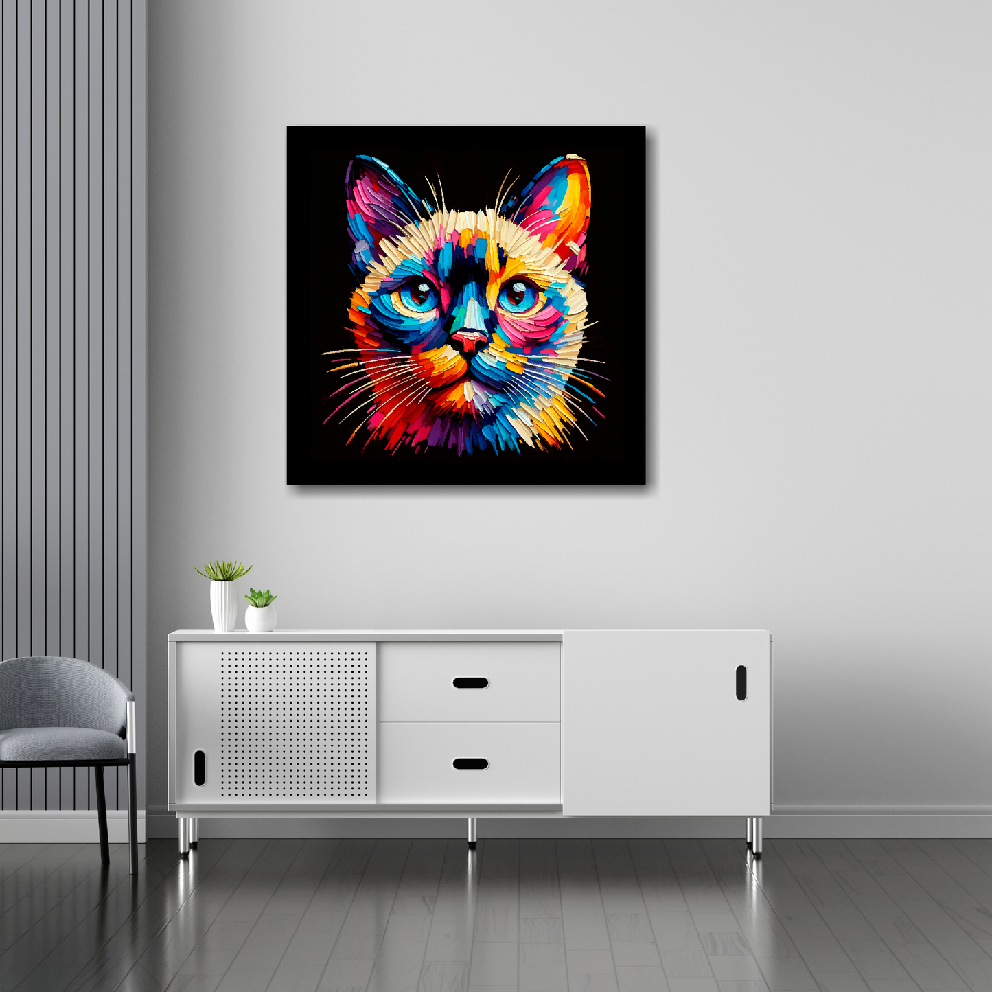30 inch by 30 inch square canvas of a colourful Tonkinese cat head portrait on a black background. Mounted on a white wall above a white sideboard.