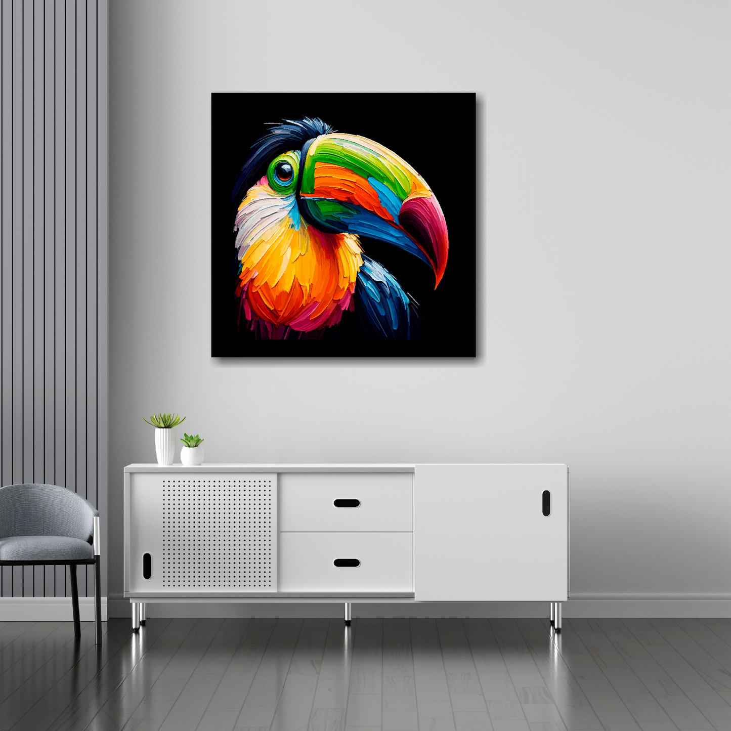30 inch by 30 inch square canvas of a colourful Toucan portrait on a black background. Mounted on a white wall above a white sideboard.