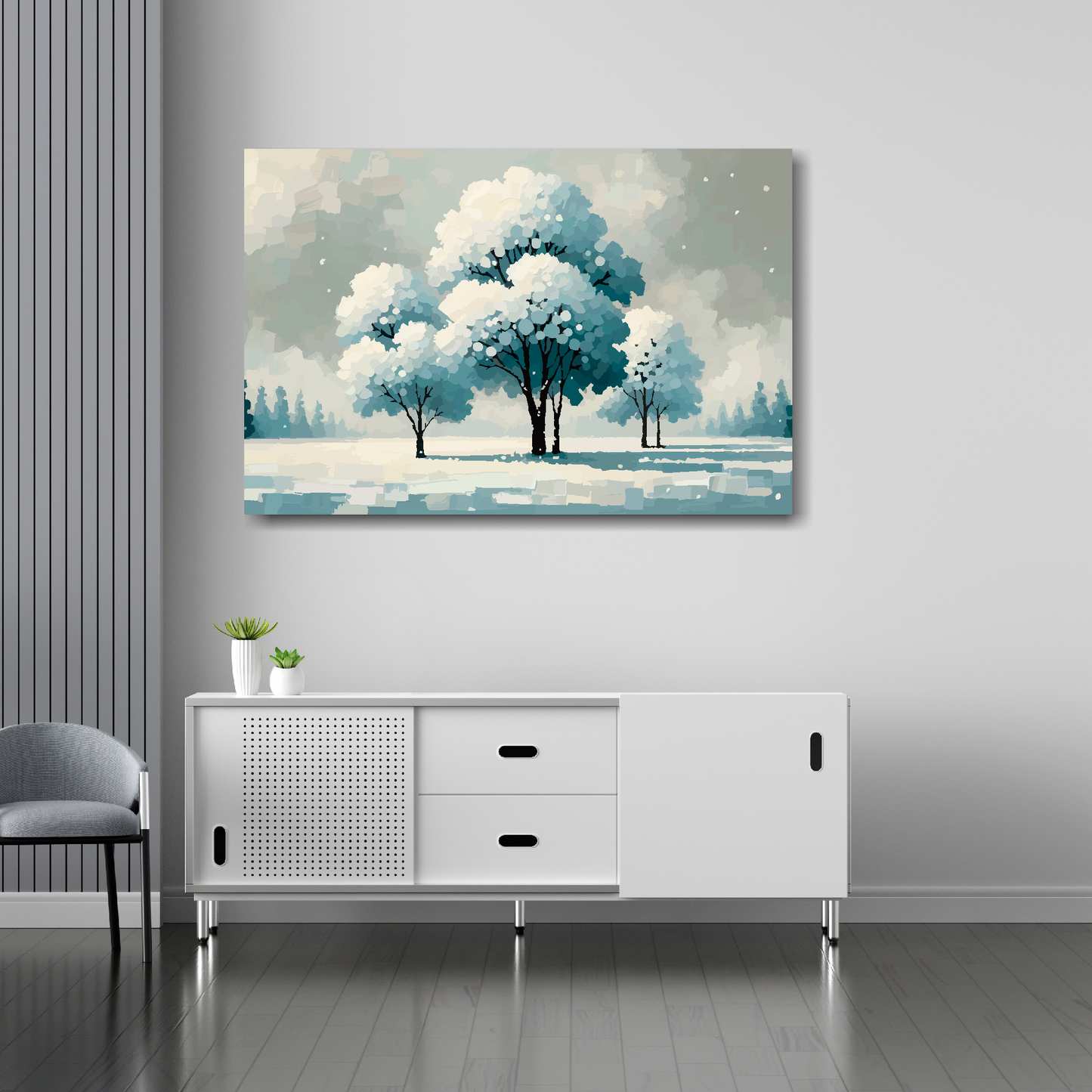 36 inch by 24 inch canvas featuring a winter landscape with snow covered trees. Mounted on a white wall above a white sideboard.