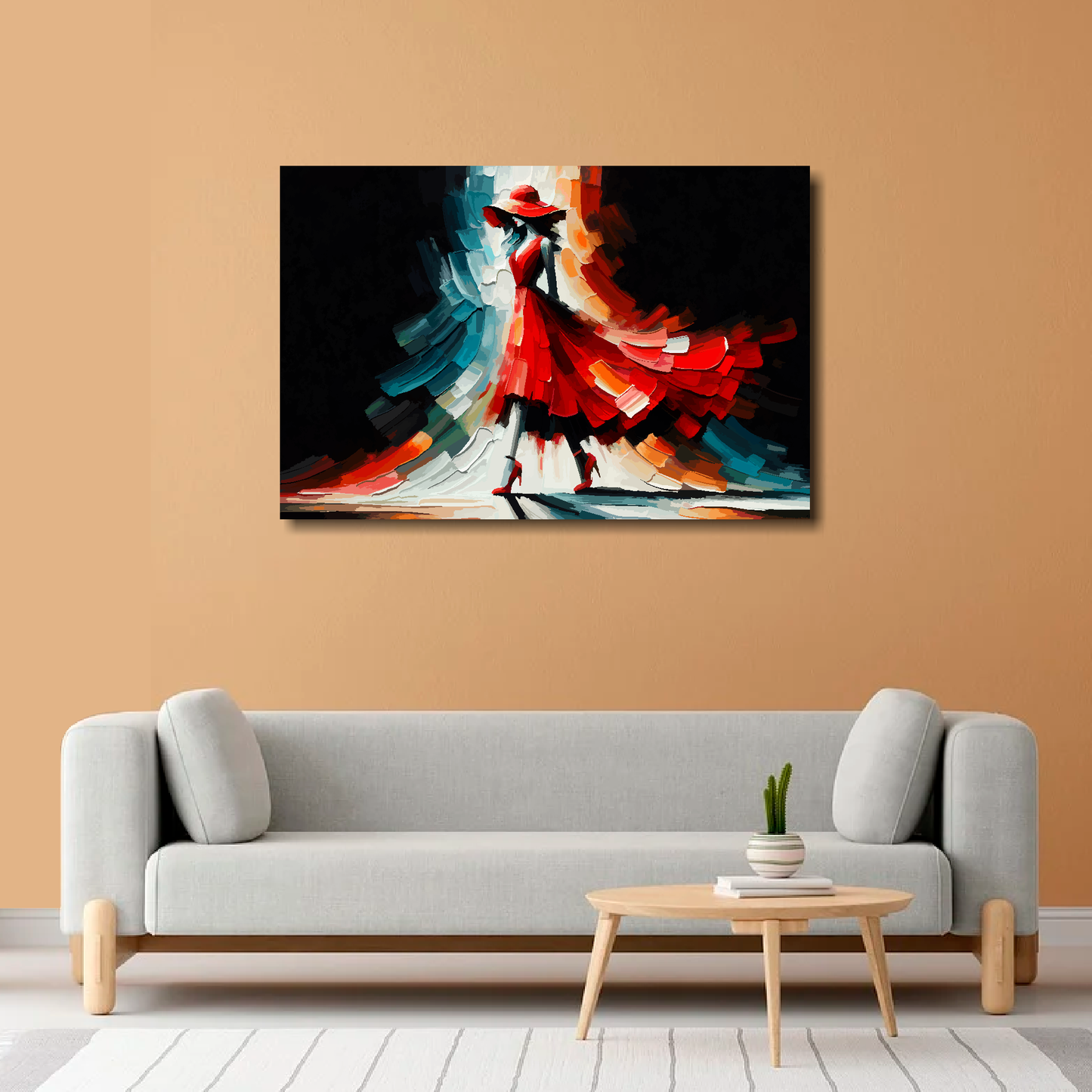 Large abstract canvas print of a woman in a red fashion dress. Mounted on a orange wall above a gray sofa.