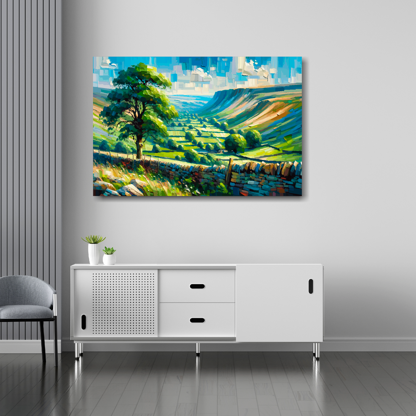 36 inch by 24 inch abstract canvas print of a Yorkshire Dales landscape. Mounted on a white wall above a white sideboard.
