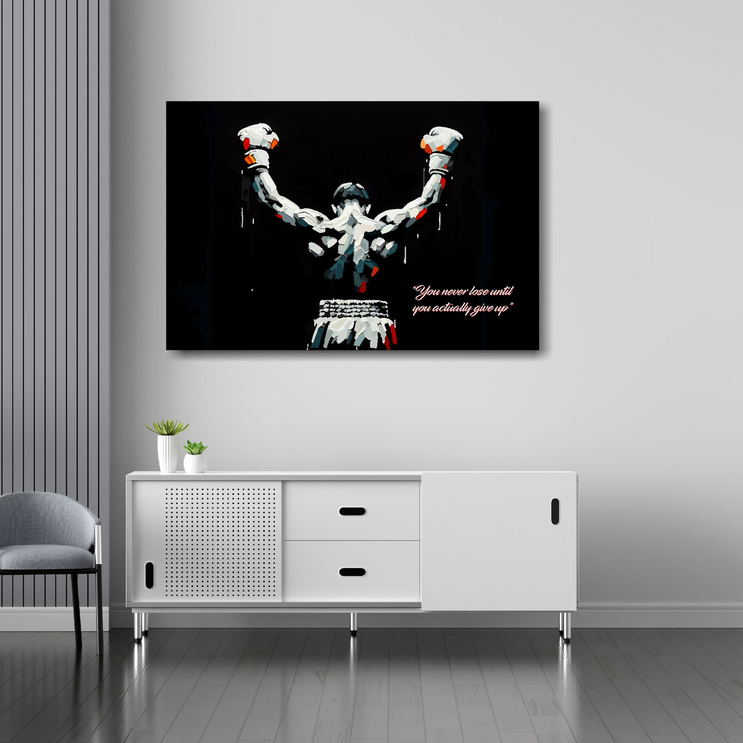36 inch by 24 inch landscape canvas featuring a boxer with raised arms on a black background. Mounted on a white wall above a white sideboard.