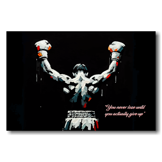 Motivational landscape canvas featuring a boxer with raised arms on a black background. Text in bottom right hand corner reading "You never lose until you actualy give up".
