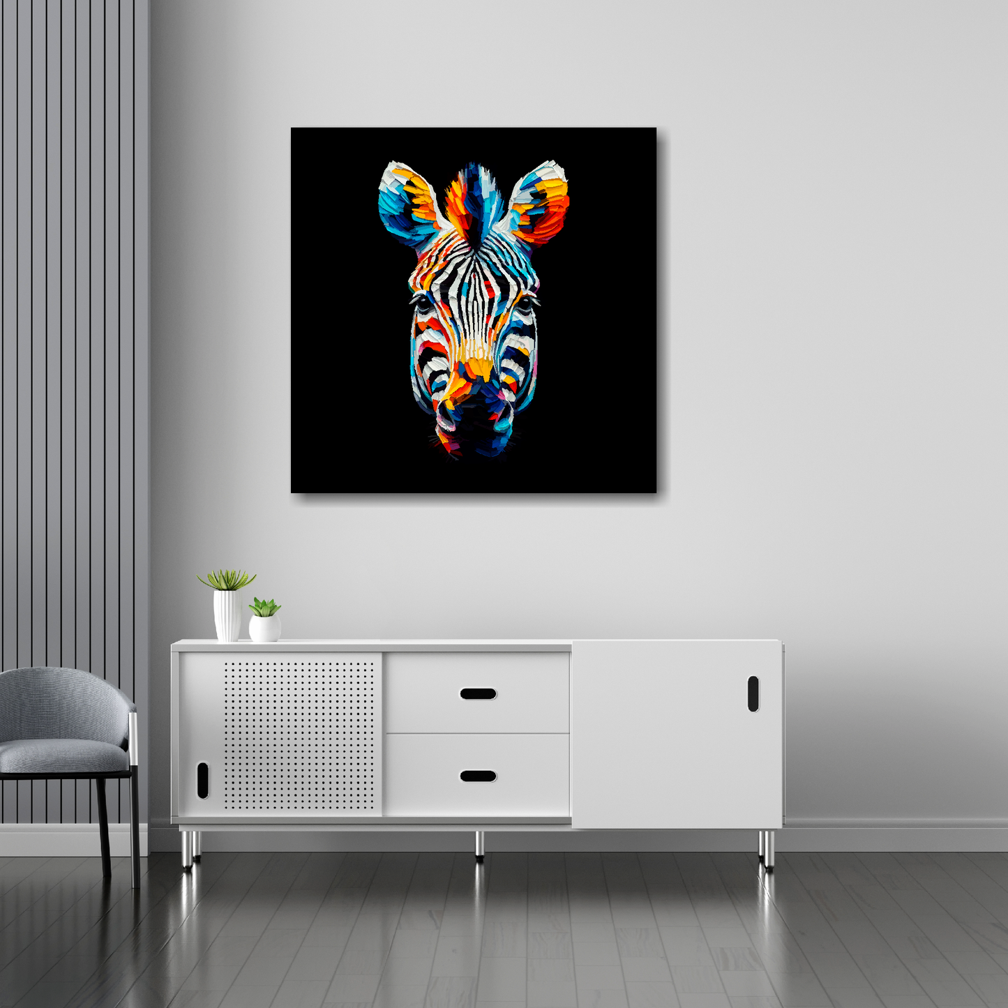 30 inch by 30 inch square canvas of a colouful Zebra head portrait on a black background. Mounted on a white wall above a white sideboard.